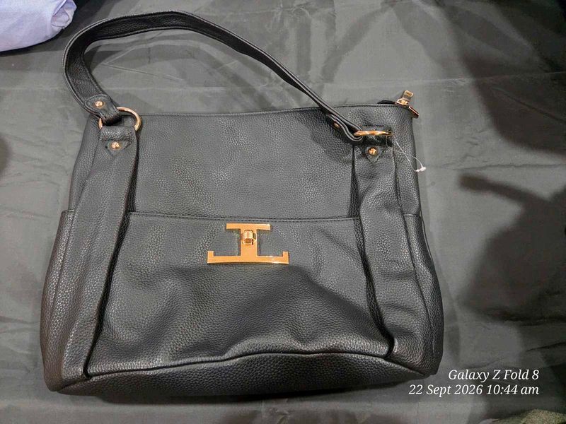 Stylish Black Faux Leather Handbag from malaysia