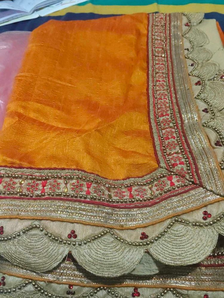 Stunning Orange Embroidered Saree