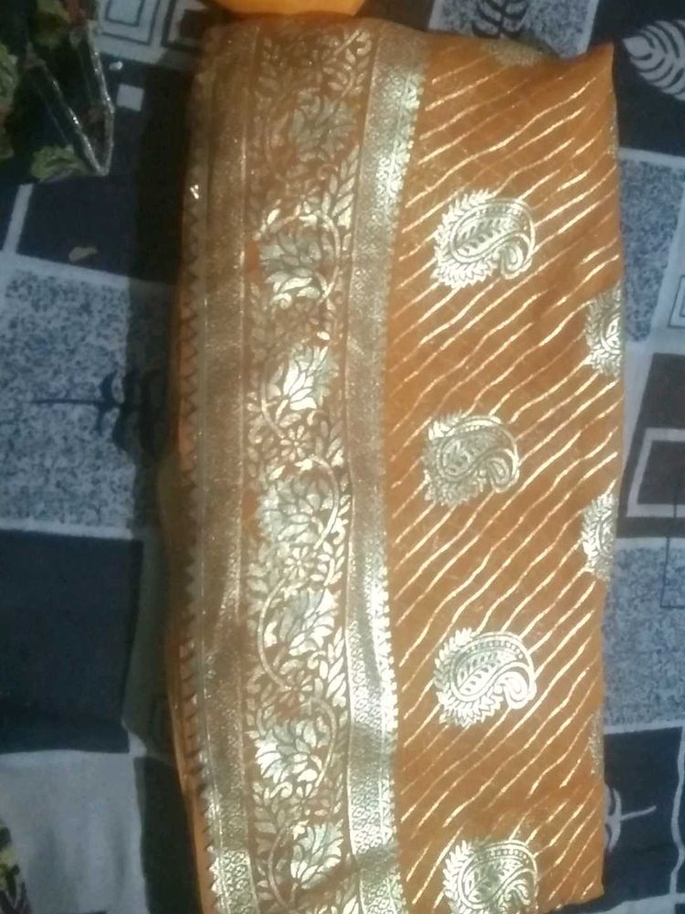 Elegant Yellow Saree with Golden Print