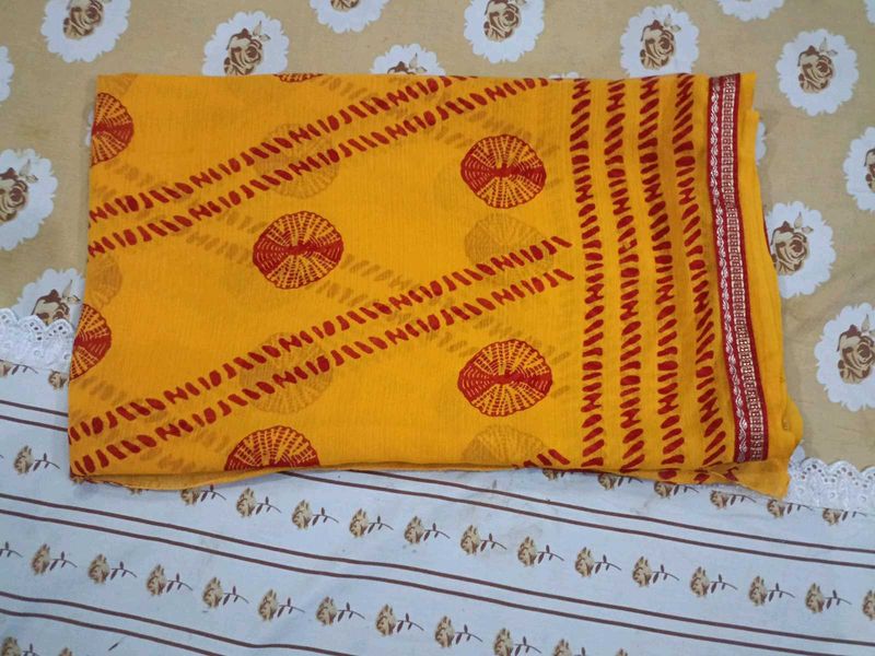 Vibrant Yellow Saree with Red Bandhani Print