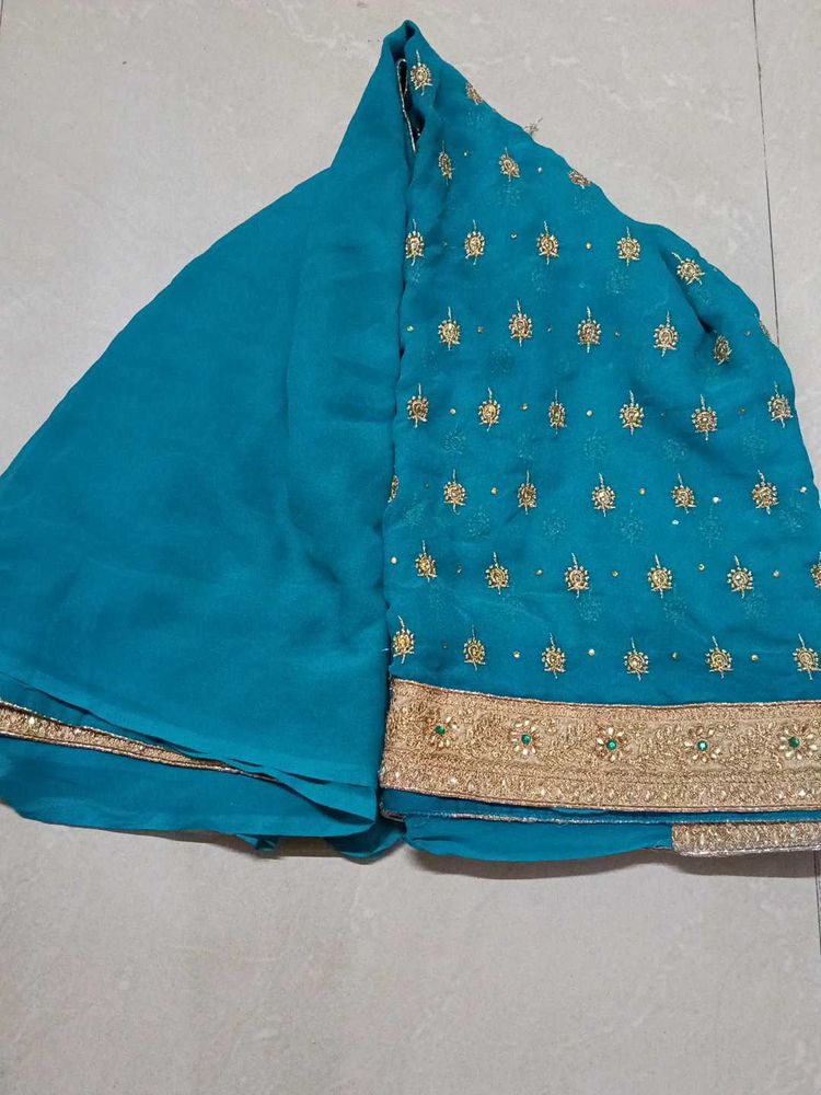 Beautiful Teal Embroidered Saree