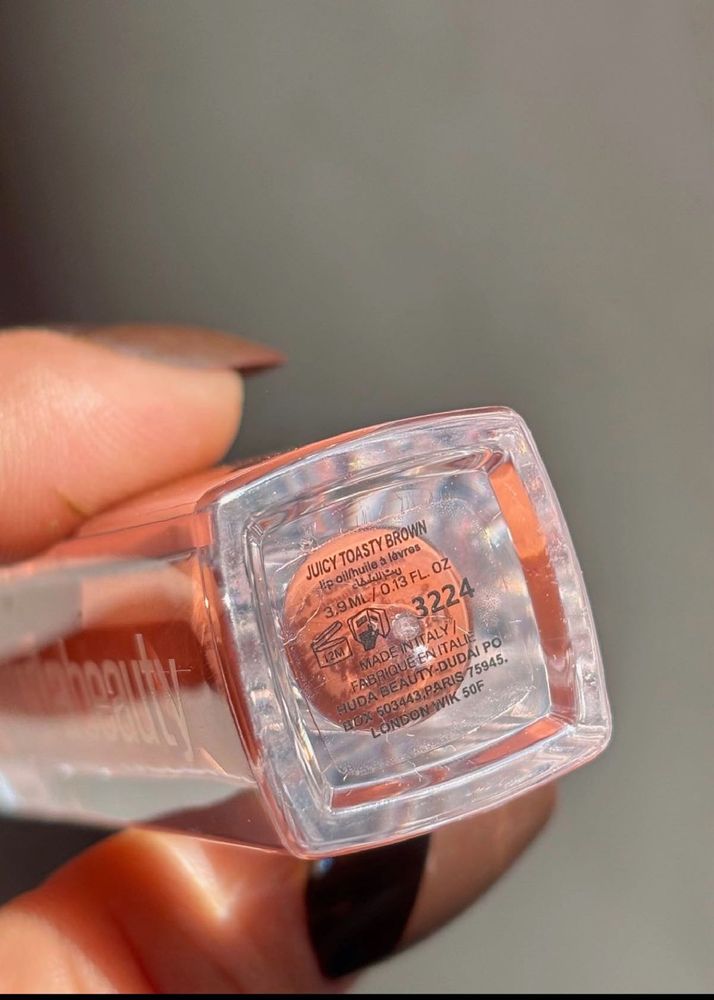 Huda Beauty lip oil and filter blush combo