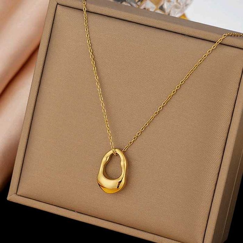 Elegant Gold Tone Pendant Necklace