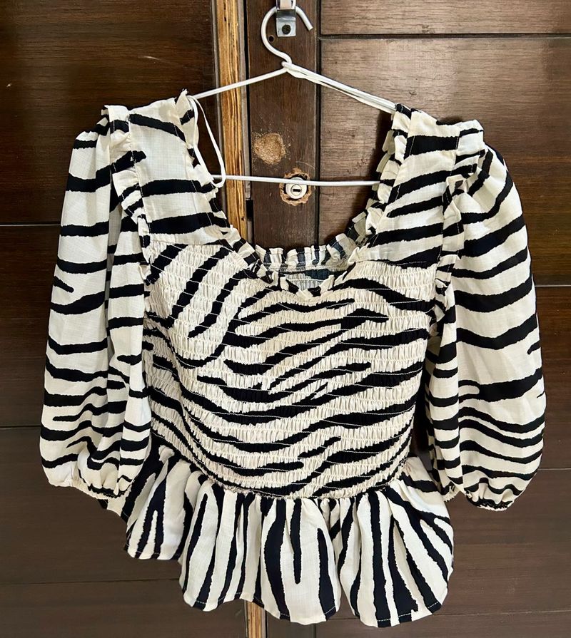 Zebra Print Smocked Peplum Top