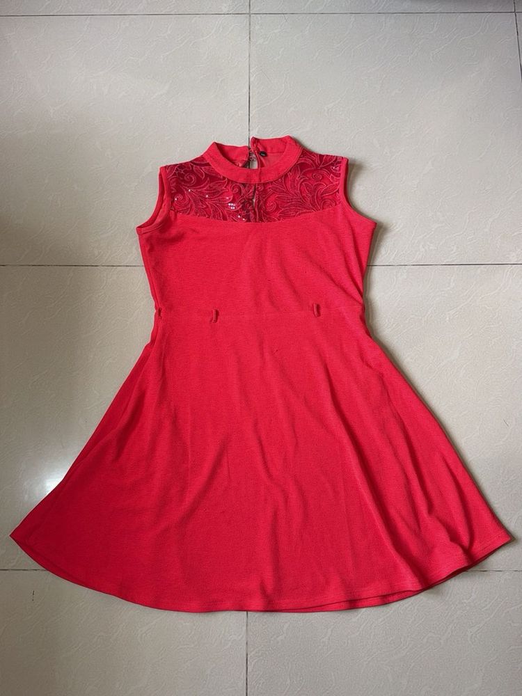 Elegant Red Sleeveless Dress with Sequins
