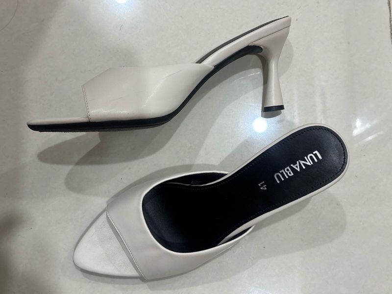 Elegant White Heeled Mules