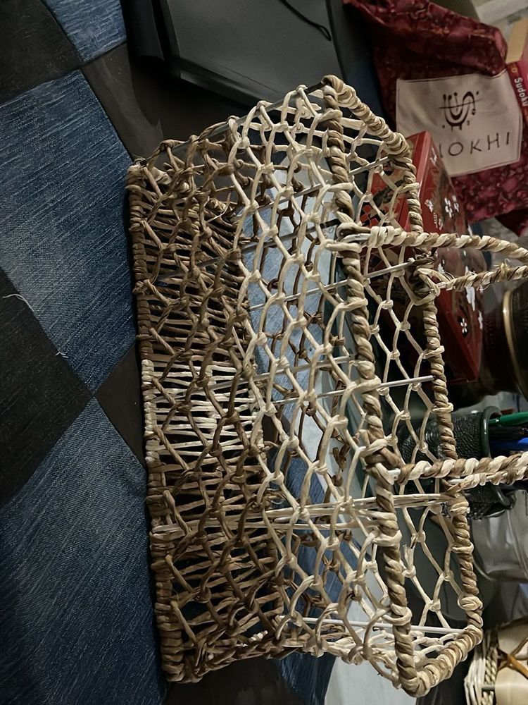 Woven basket on a metal frame