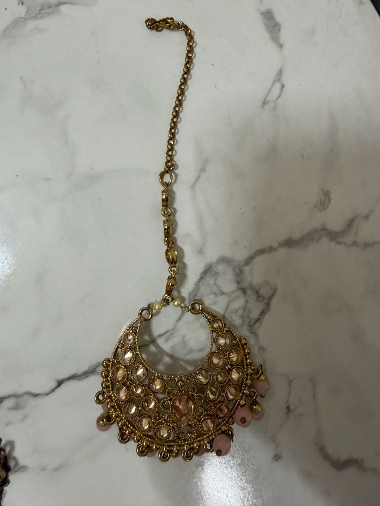 Exquisite Gold Maangtika with Pink Stones