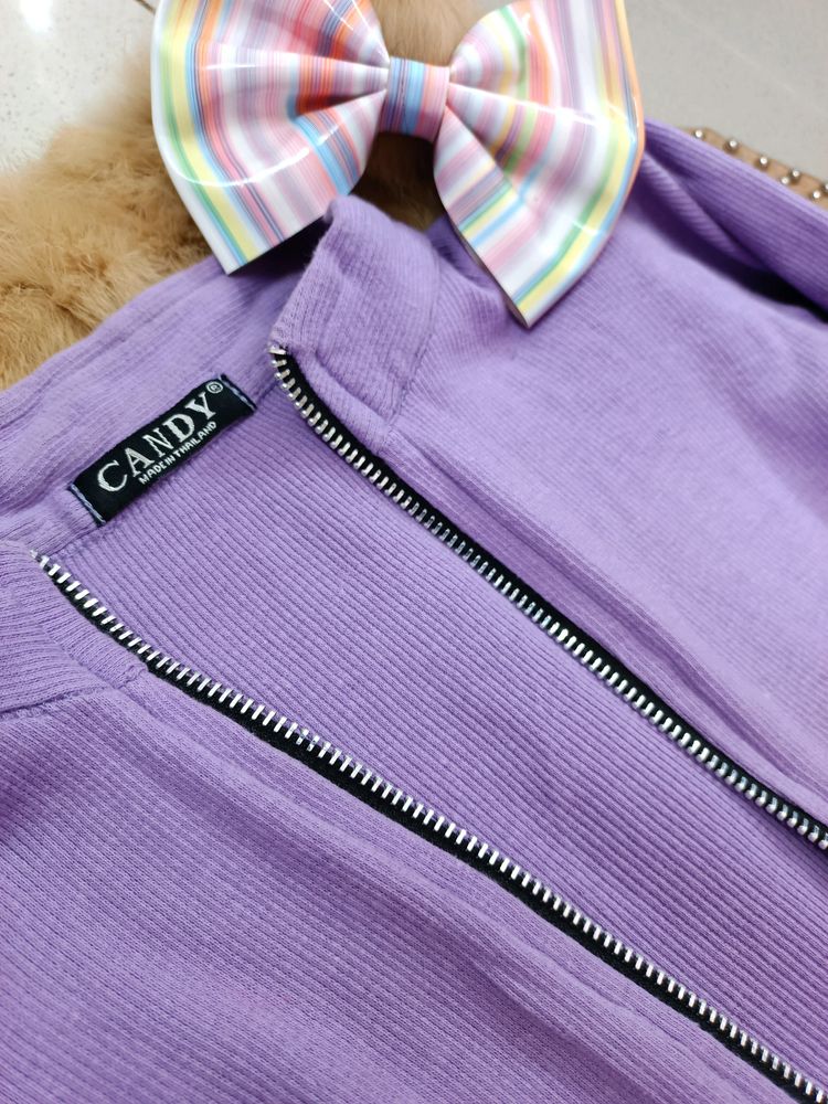 A Fitted Crop Top With Zip That Looks Super Cool
