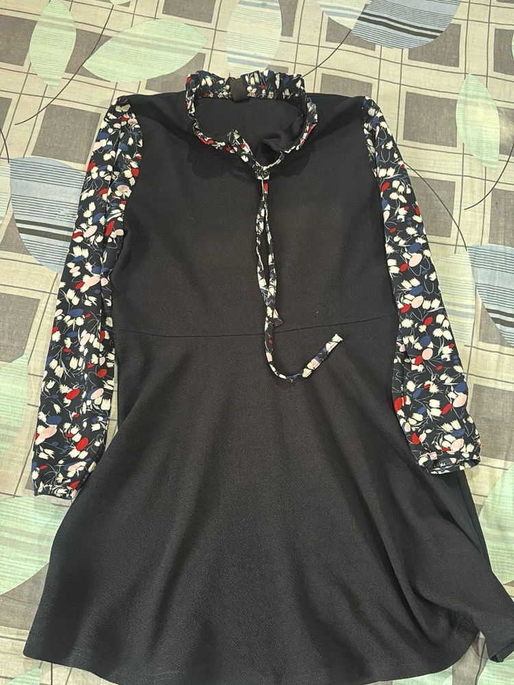 Chic Black Dress with Floral Sleeves