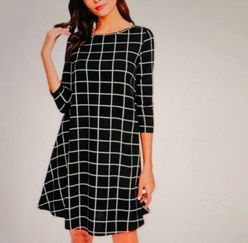 SHEIN Black checkered A-line dress.