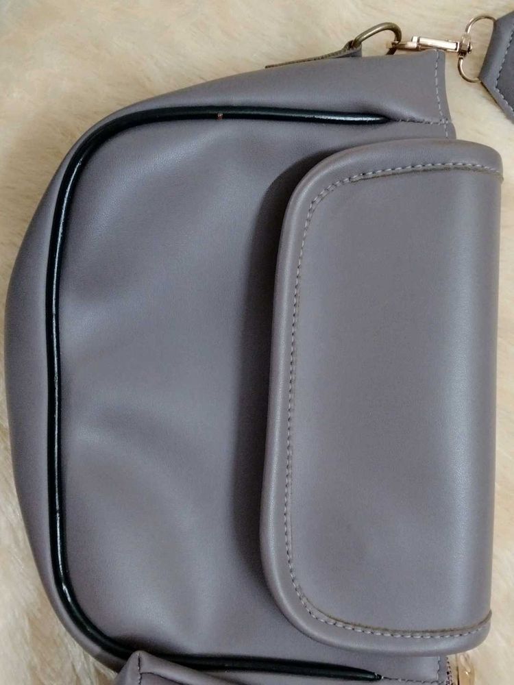 Stylish lavender crossbody bag with coin purse