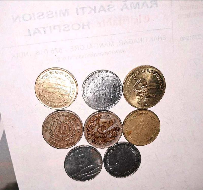 8 different commemmorative coins