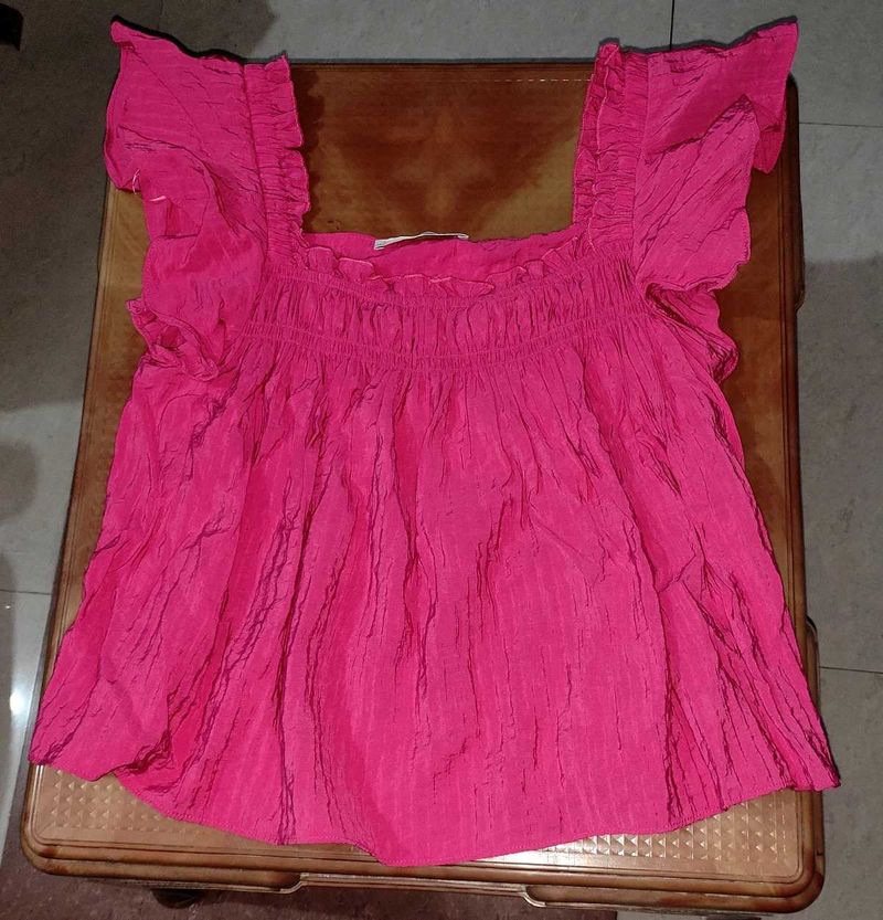 MANGO's Pink Flutter Sleeve Top