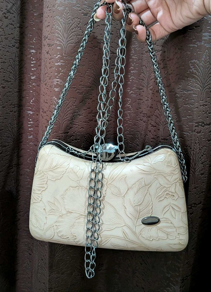 Elegant Embossed Clutch with Chain Strap