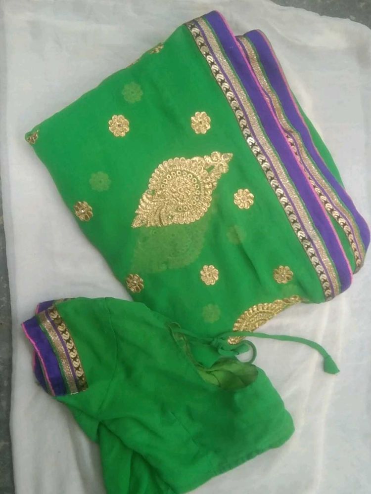 Vibrant Green Saree with Golden Embroidery