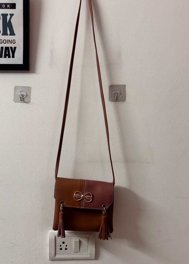 Stylish Brown Crossbody Bag with Tassels