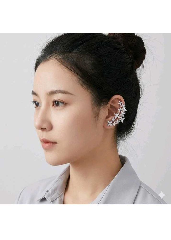 A D silver tone earrings.