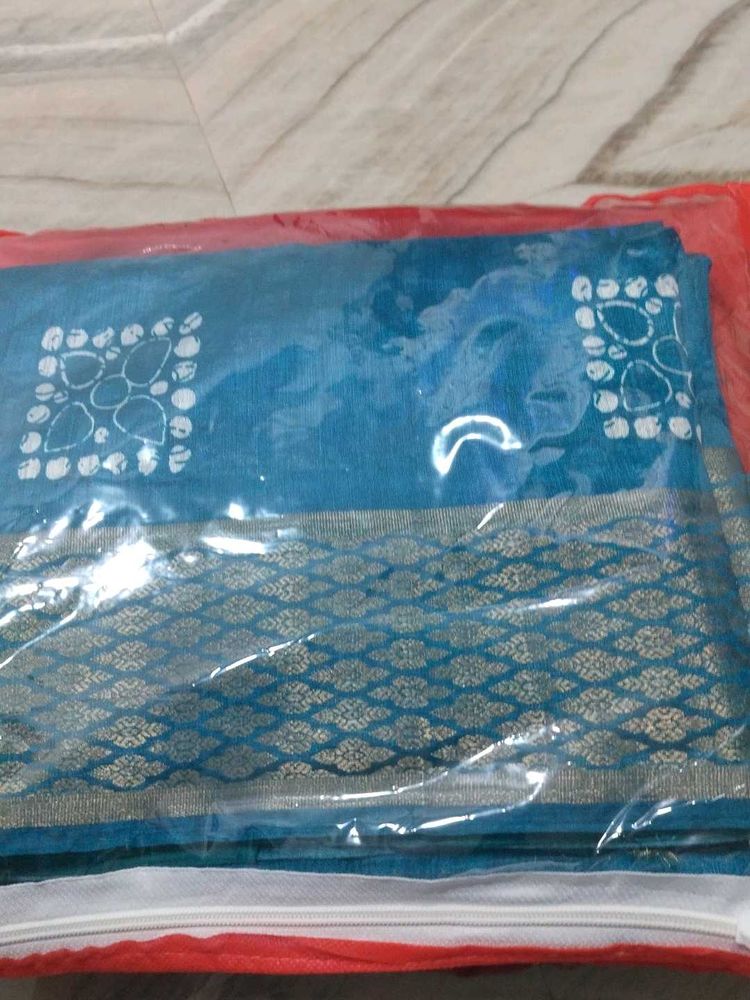 Beautiful Teal Saree with Intricate Gold Border