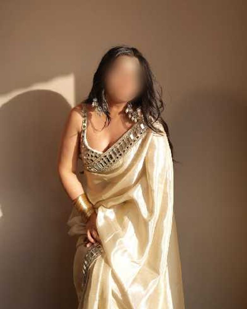 Elegant Cream Saree with Embellished Blouse