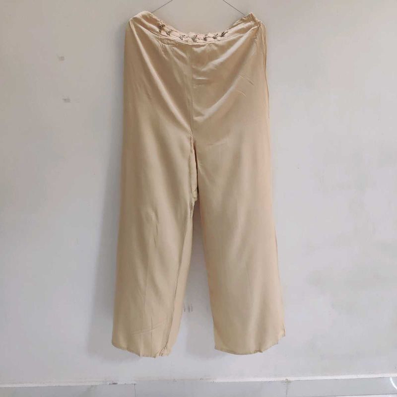Elegant Beige Palazzos with Embellished Waist