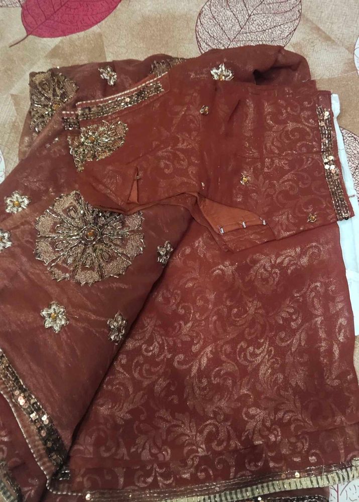 Elegant Brown Embroidered Saree