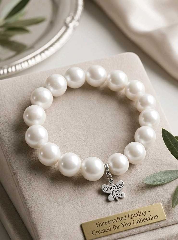 Elegant Pearl Bracelet with Butterfly Charm