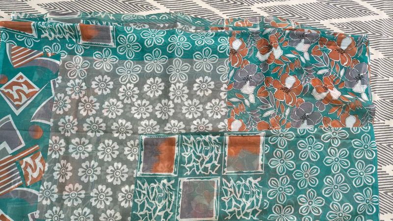 super net material sea green saree