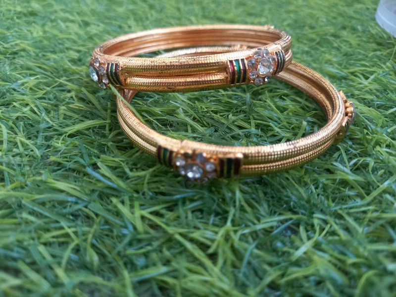 Elegant Gold Bangles with Stone Embellishments