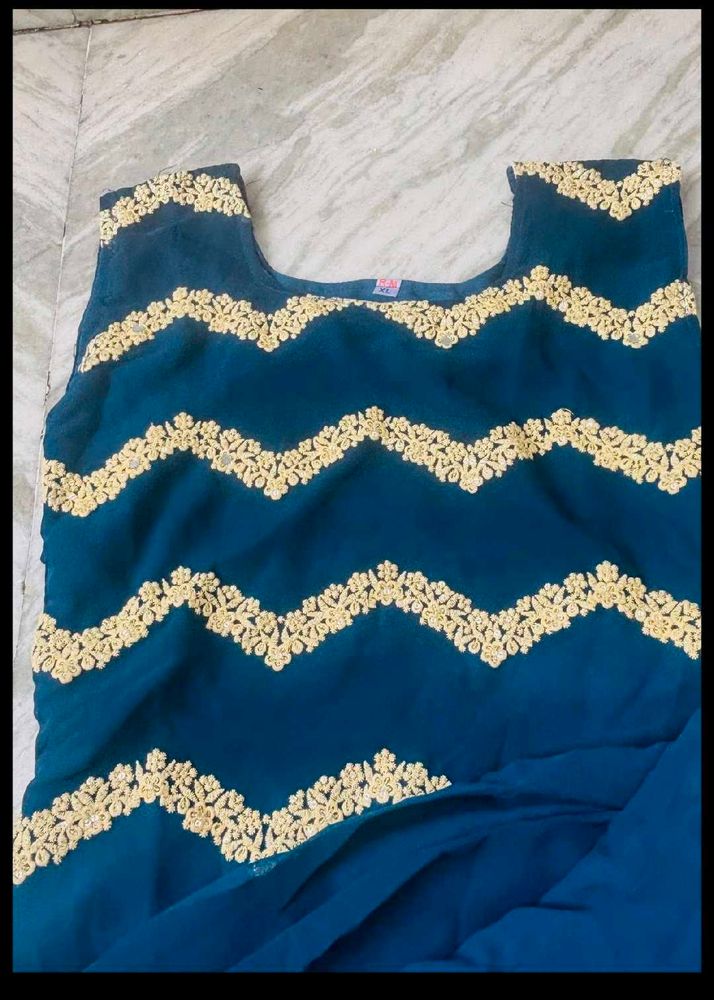 Stunning Teal shut with Golden Embroidery
