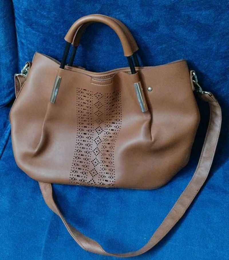 Brown Bag With Cutwork Design In Front
