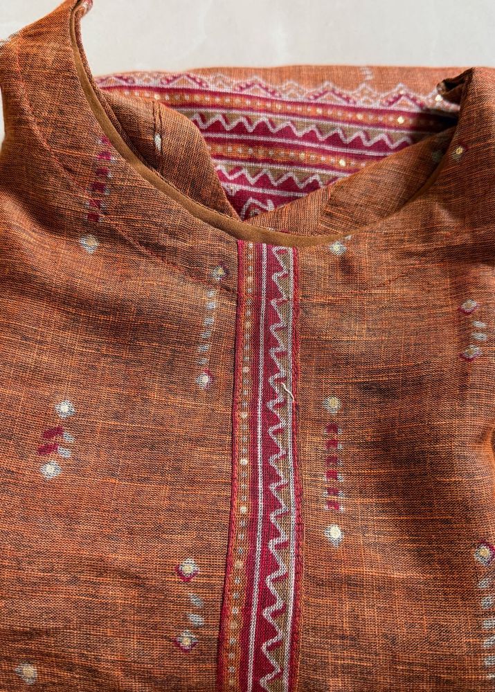Orange Kurta with Embellished Neckline
