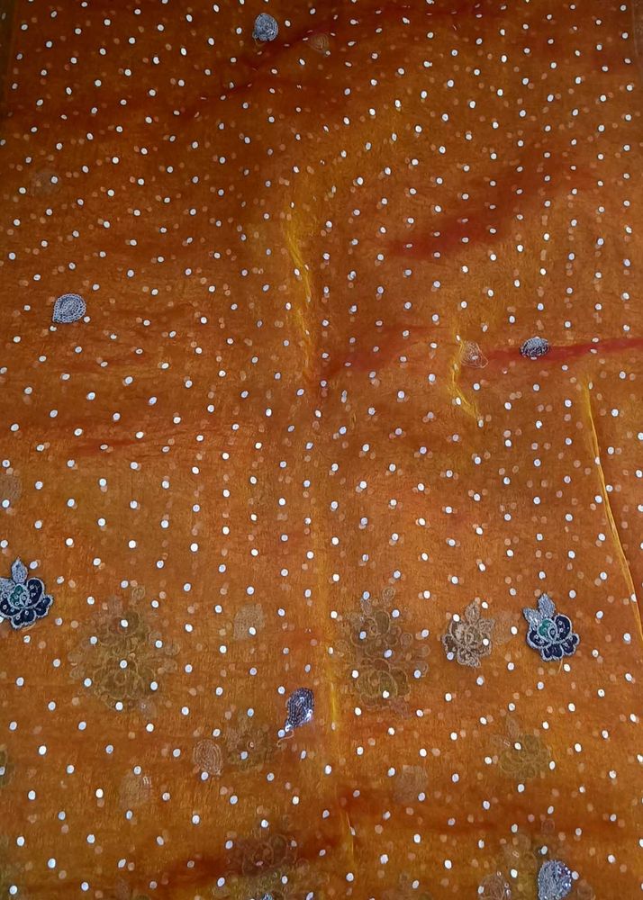 Elegant Orange Saree with White Polka Dots