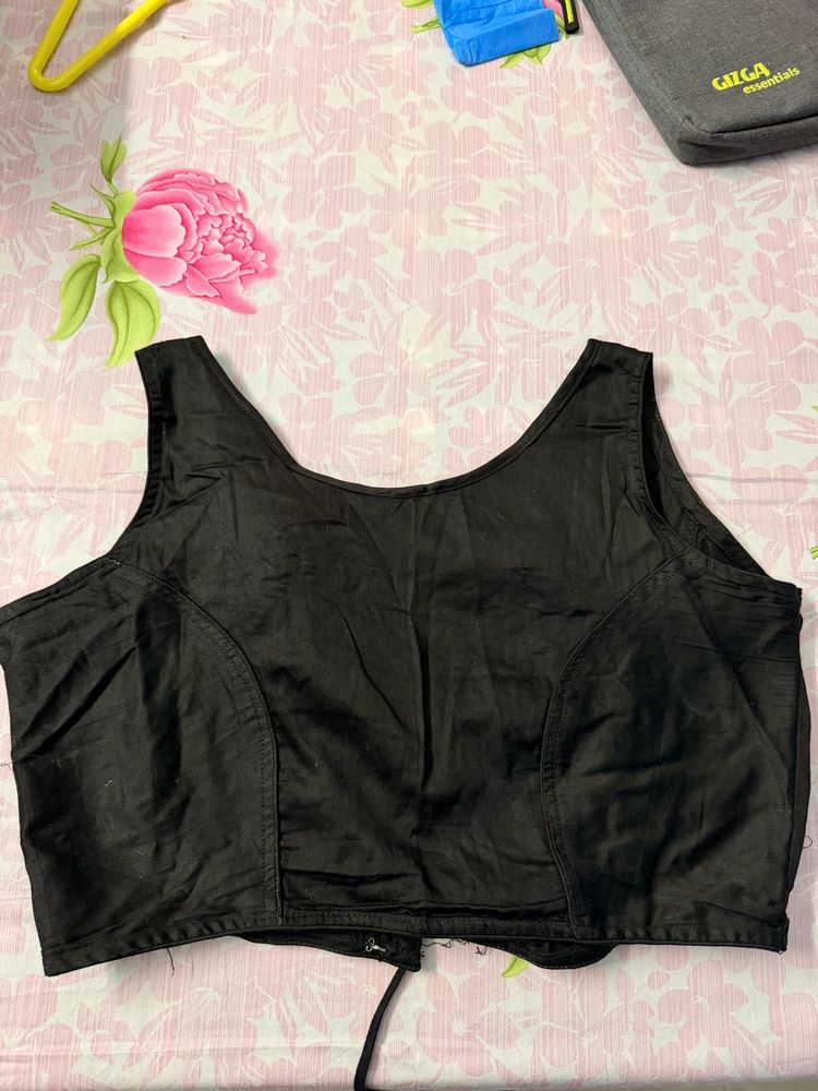 New Sleek Black Sleeveless Blouse