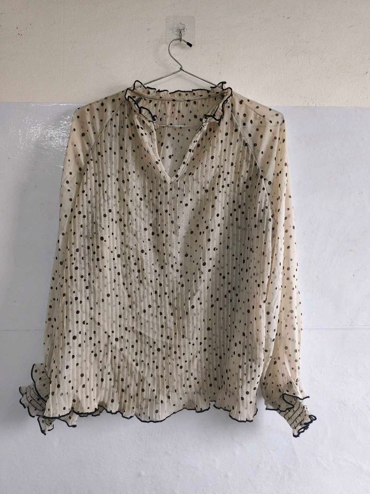 polka dot blouse