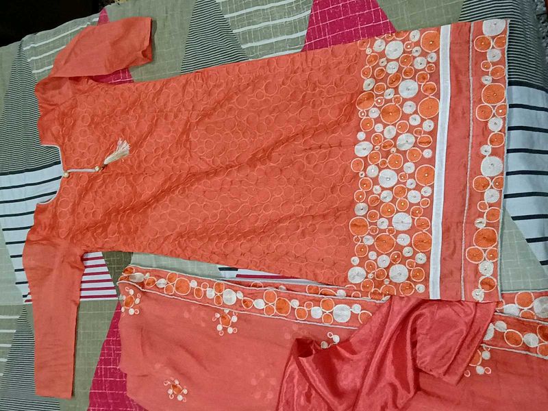 Orange Kurta Set with Intricate Detailing
