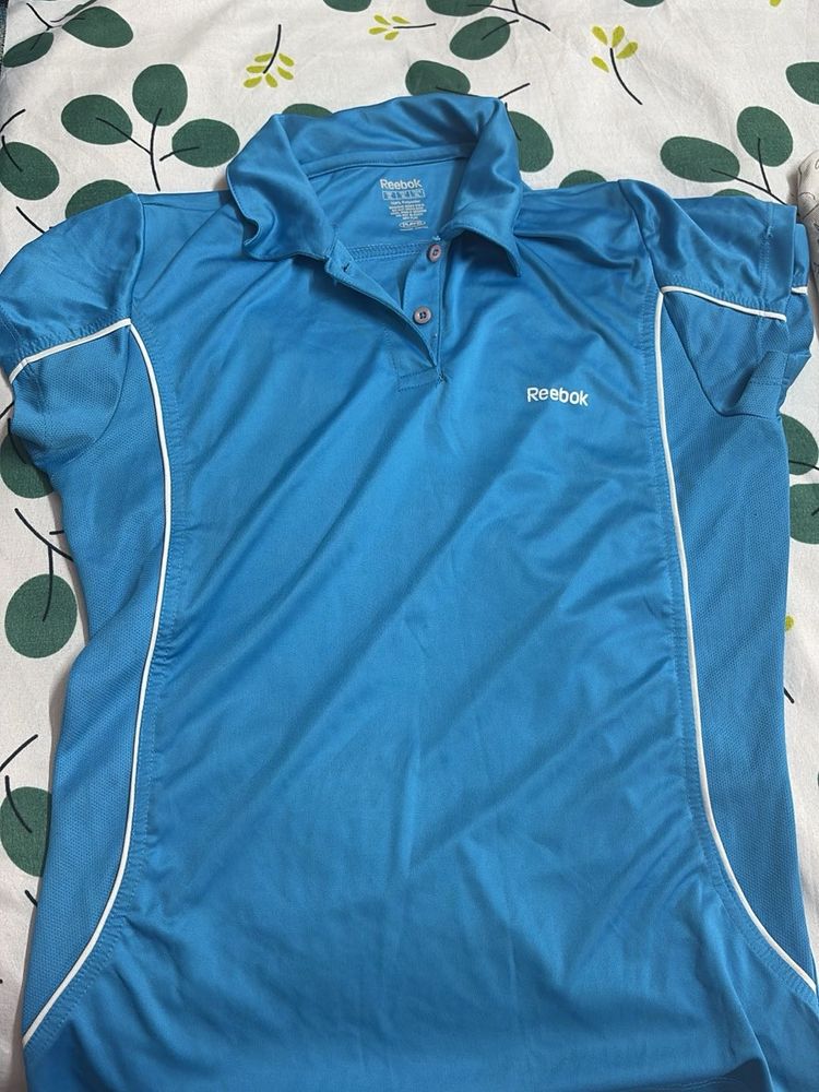 Reebok Women's Blue Athletic Polo Shirt
