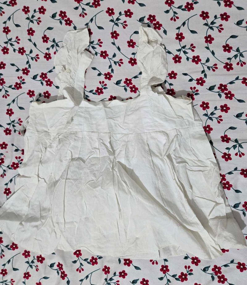 White Ruffled Sleeveless Top