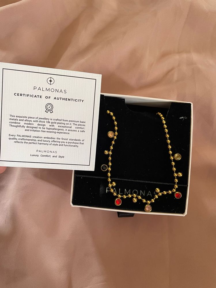 Palmonas Gold Beaded Necklace with Charms