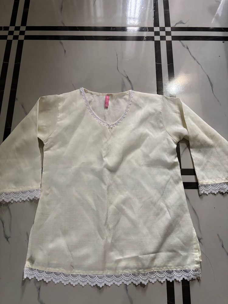 NewElegant Cream Kurta with Lace Trim
