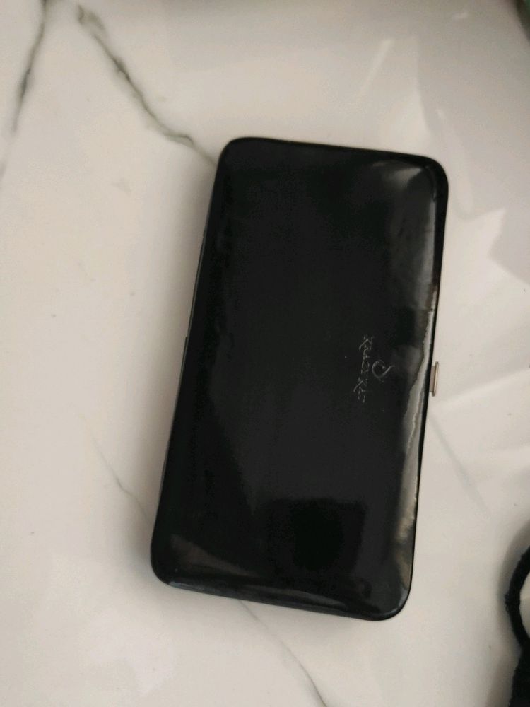 black wallet with press lock