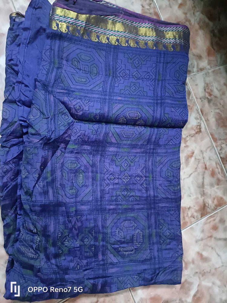 Vibrant Blue Saree with Intricate Pattern