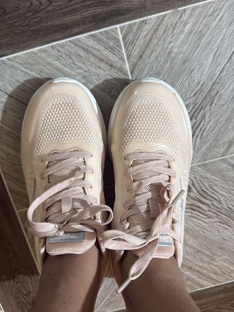 peach color sneakers