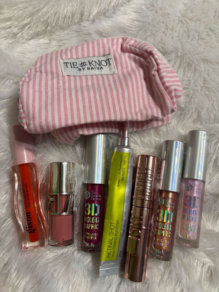 Assorted Lip Glosses and Makeup Bag