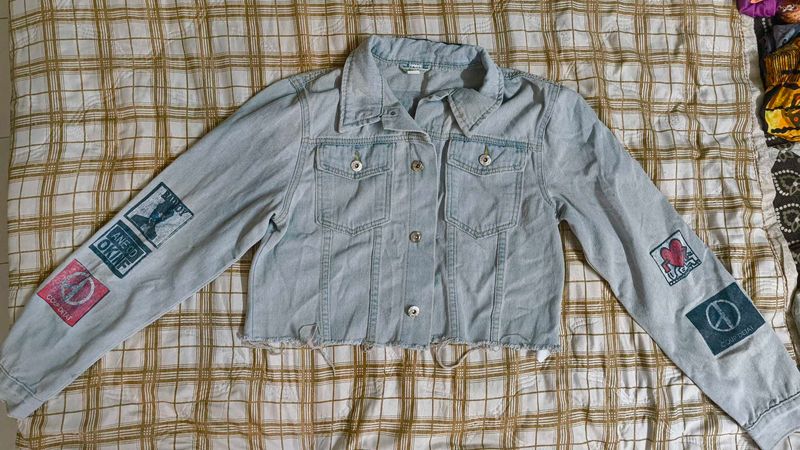 Light Wash Denim Jacket with Patches