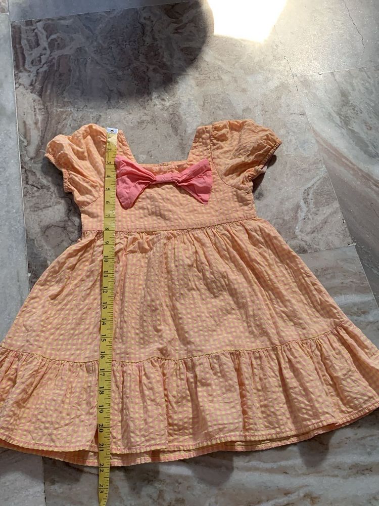 Cute Peach Dress with Pink Bow