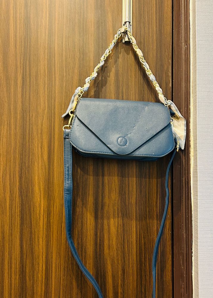 Chic Blue Crossbody Bag with Scarf Detail