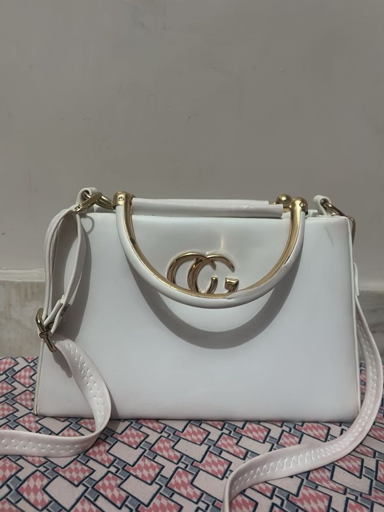 Chic White Handbag with Gold Accent