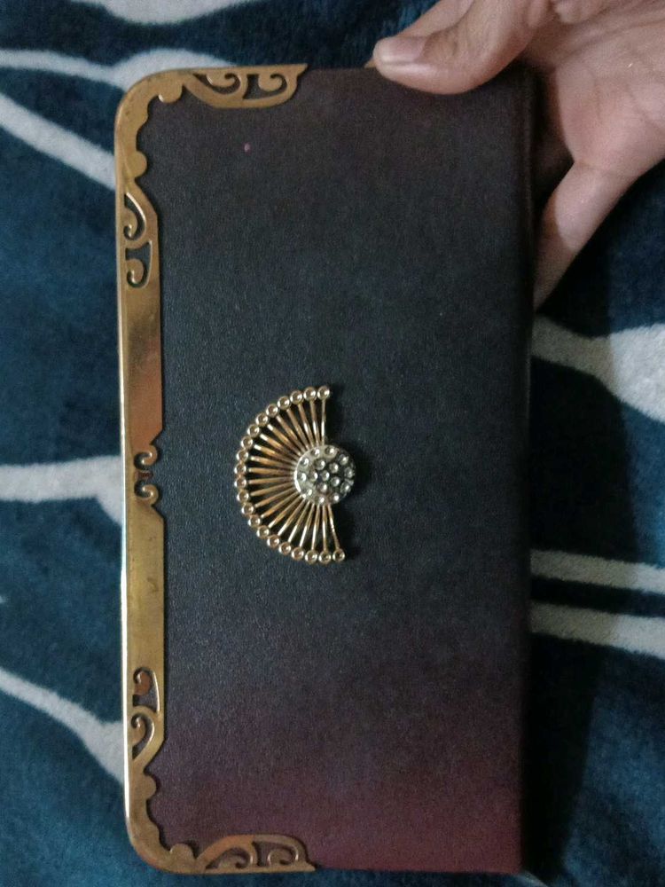 Elegant Clutch with Ornate Details