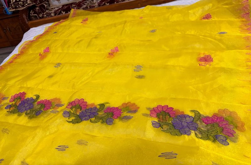 Vibrant Yellow Saree with Floral Motifs